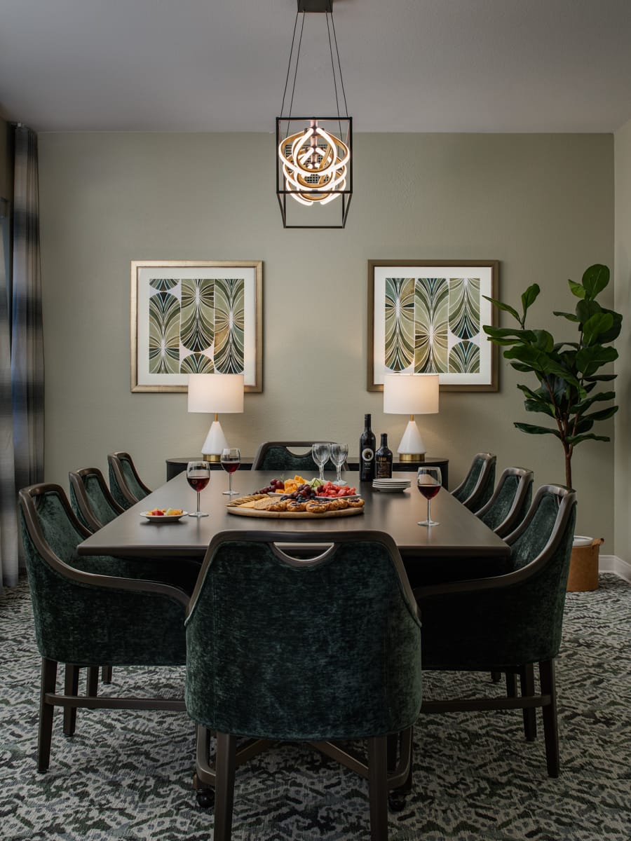 Private dining room with a table for four beside a window